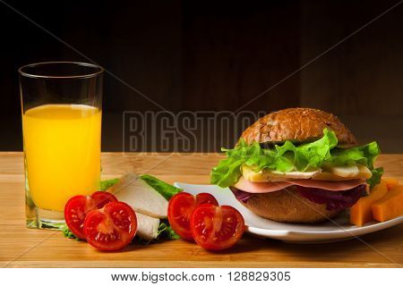 Sandwich with chicken, cheese and salad. Healthy fast food.