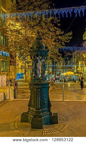 JERUSALEM ISRAEL - FEBRUARY 17 2016: The scenic fountain in Ben Yehuda pedestrian street decorated with the scenic women sculptures on February 17 in Jerusalem.