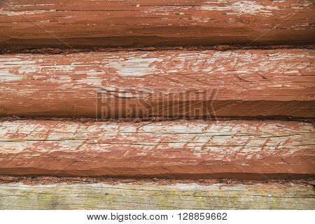 Wooden wall from logs as a background texture