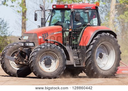 GRIMMEN/ GERMANY - MAY 5: german case puma cvx 150 tractor drives on track on a motortechnic festival on may 5 2016 in grimmen / Germany.