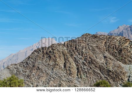 In Oman  The Old Mountain Gorge And Canyon The Deep Cloudy  Sky
