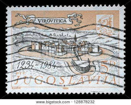 ZAGREB, CROATIA - SEPTEMBER 18: a stamp printed in Yugoslavia shows The 700th Anniversary of Virovitica, circa 1984, on September 18, 2014, Zagreb, Croatia
