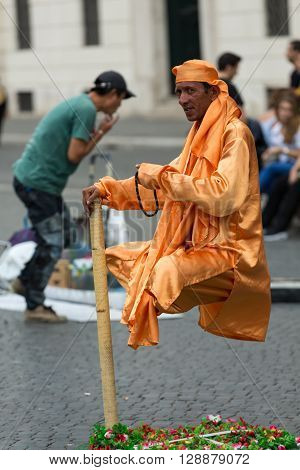 Rome Italy - June 12 2015: Indian Fakirs Performing Levitation Trick In Rome Italy