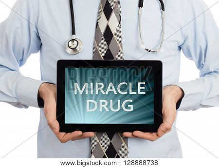 Doctor Holding Tablet - Miracle Drug