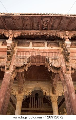 Beautiful and classic architecture of Amber Fort in Jaipur, Rajasthan. Diwan-e-Aam or The Hall of the Public is seen with magnificently crafted pillars showcasing Rajput edifice.