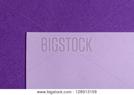 Eva foam ethylene vinyl acetate smooth light purple surface on purple sponge plush background