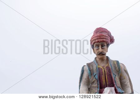 Ottoman man figure in tradational clothes on a white background