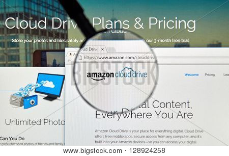MONTREAL CANADA - MAY 8 2016 : Amazon Cloud Drive web page under magnifying glass. Amazon Cloud Drive is a web storage application from Amazon.