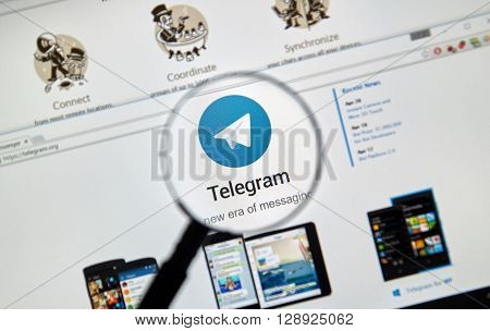 MONTREAL CANADA - MAY 8 2016 : Telegram messnger web site under magnifying glass. Telegram is a cloud-based instant messaging service.