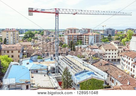 Construction Site. Construction Crew Working On The Roof Sheeting.
