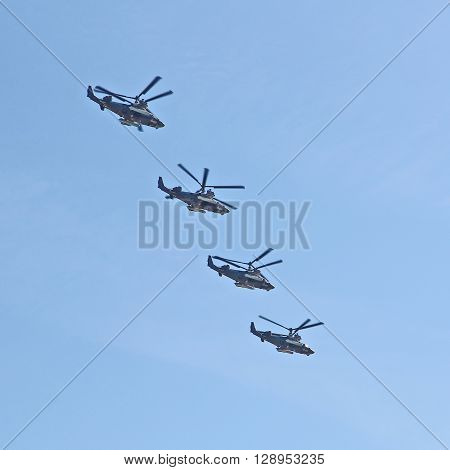 MOSCOW RUSSIAN - MAY 9 2013: Demonstration flight of military helicopters a parade dedicated to the Soviet victory over Germany. For editorial use only.