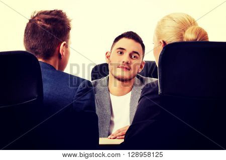 Business meeting-three people sitting and talking