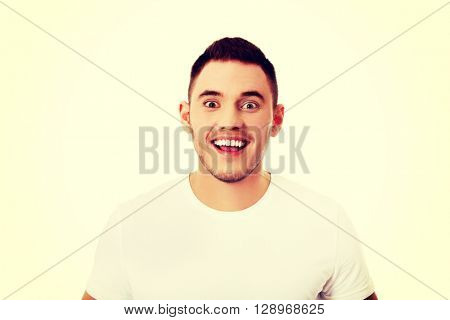Portrait of young happy handsome man