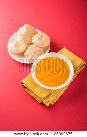 Aamras or Aam Ras Puri: Puri which is an indian fried small bread and alphonso mango pulp is a popular lunch especially during Padwa, the Marathi new year, maharashtrian lunch/dinner menu