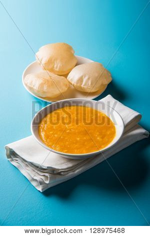 Aamras or Aam Ras Puri: Puri which is an indian fried small bread and alphonso mango pulp is a popular lunch especially during Padwa, the Marathi new year, maharashtrian lunch/dinner menu