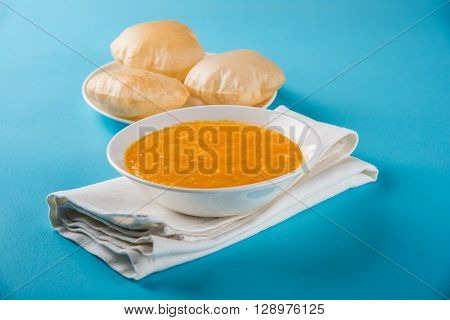 Aamras or Aam Ras Puri: Puri which is an indian fried small bread and alphonso mango pulp is a popular lunch especially during Padwa, the Marathi new year, maharashtrian lunch/dinner menu