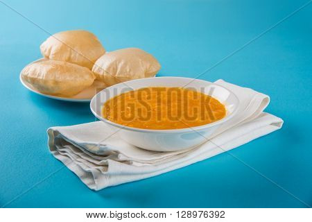 Aamras or Aam Ras Puri: Puri which is an indian fried small bread and alphonso mango pulp is a popular lunch especially during Padwa, the Marathi new year, maharashtrian lunch/dinner menu