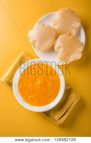 Aamras or Aam Ras Puri: Puri which is an indian fried small bread and alphonso mango pulp is a popular lunch especially during Padwa, the Marathi new year, maharashtrian lunch/dinner menu