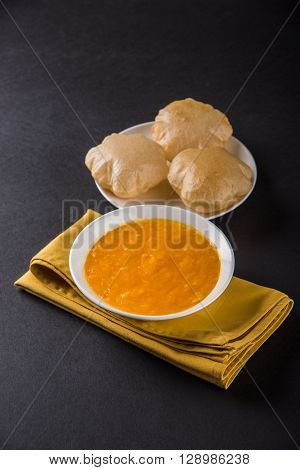 Aamras or Aam Ras Puri: Puri which is an indian fried small bread and alphonso mango pulp is a popular lunch especially during Padwa, the Marathi new year, maharashtrian lunch/dinner menu