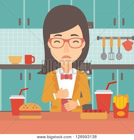 Woman suffering from heartburn.