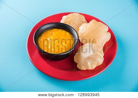 Aamras or Aam Ras Puri: Puri which is an indian fried small bread and alphonso mango pulp is a popular lunch especially during Padwa, the Marathi new year, maharashtrian lunch/dinner menu
