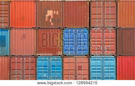 Stacked containers in a shipping terminal