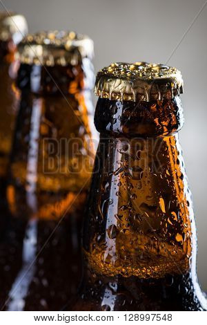 Ice Cold Beer Bottles With Drops Of Dew