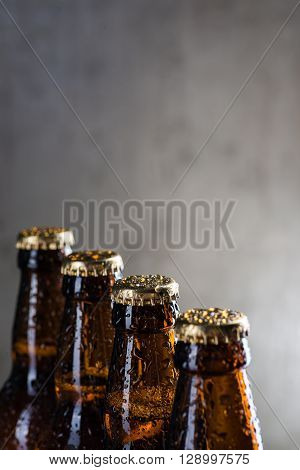 Ice Cold Beer Bottles With Drops Of Dew