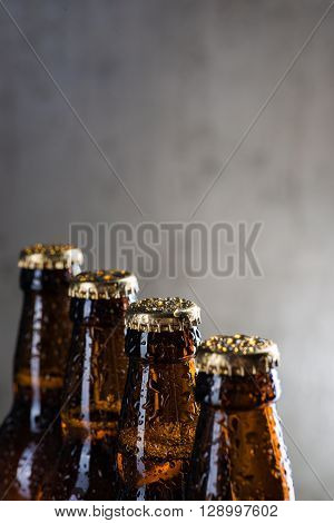 Ice Cold Beer Bottles With Drops Of Dew