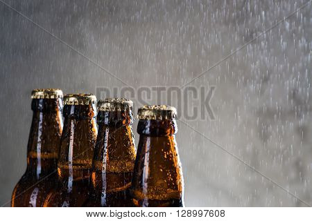 Ice Cold Beer Bottles With Drops Of Dew