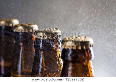 Ice Cold Beer Bottles With Drops Of Dew