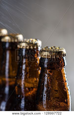 Ice Cold Beer Bottles With Drops Of Dew