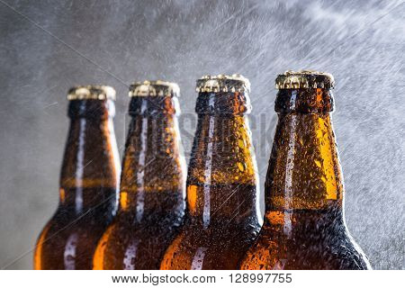 Ice Cold Beer Bottles With Drops Of Dew