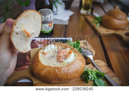 National Polish Soup Zurek In Bread. Traditional Polish Belorussian Soup Real View