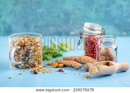differeng spices on the blue backgorund