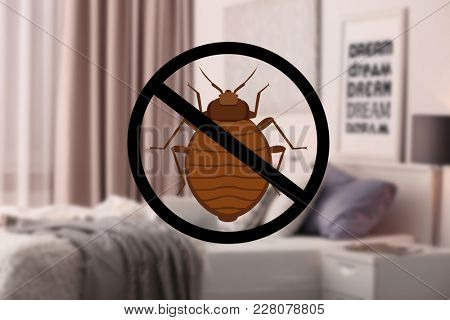 Stop bug sign and clean bed in room