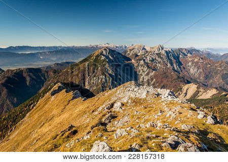 Panoramic View Of Spectacular Mountain Ridge. Slopes Of Kosuta In Autumn Colors, Slovenia.