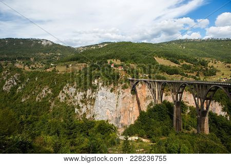 Big Bridge In Montenegro Across The River In Autumn