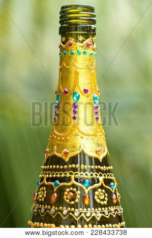 Decorative Glass Bottle Is Painted And Decorated With Rhinestones