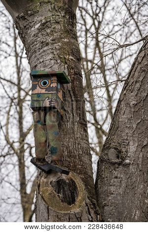 Funny House For Birds In The Form Of A Man On A Tree