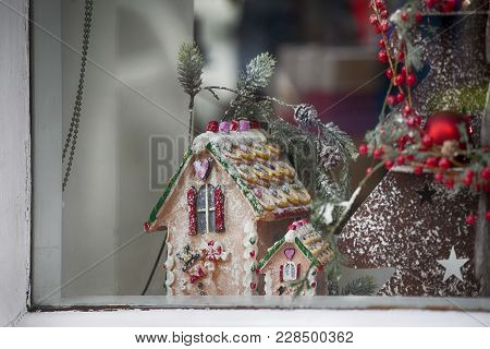 Beautiful Gingerbread House With Lights On Dark Background