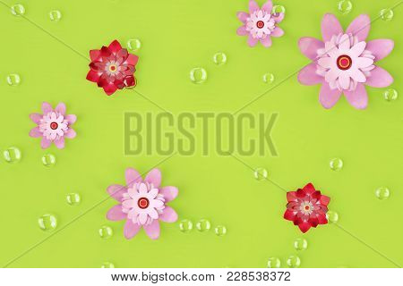 Beads And Flowers On Green Background. 3d Rendering.