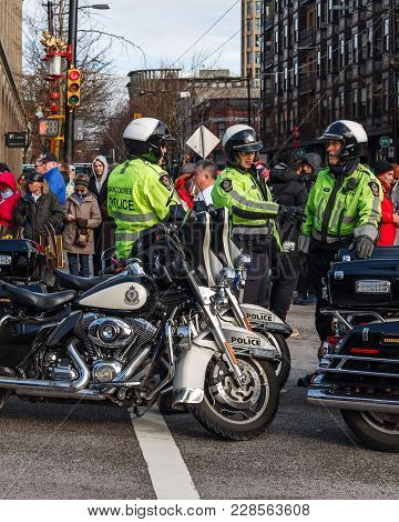Vancouver, Canada - February 18, 2018: Vancouver Police Department Motocycle Officers At Chinese New