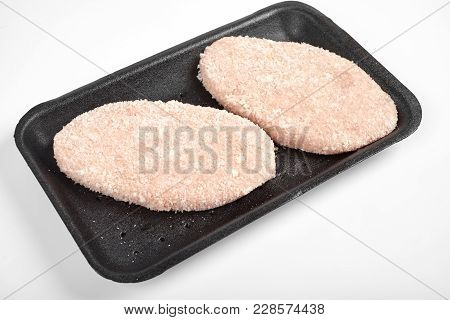 Delicious Chicken Cutlet In Package. Isolated On A White Background