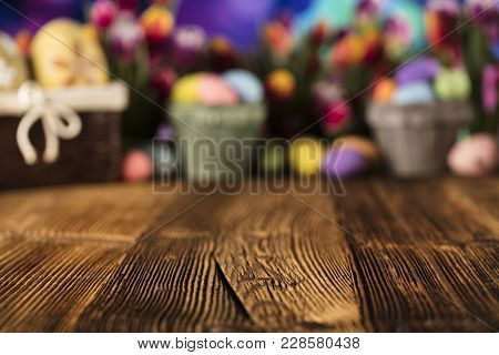 Easter Theme. Easter Eggs. Colorful Tulips. Rustic Wooden Table. Shallow Depth Of Focus. Bokeh Backg