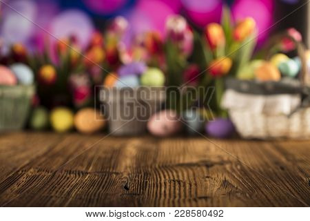 Easter Theme. Easter Eggs. Colorful Tulips. Rustic Wooden Table. Shallow Depth Of Focus. Bokeh Backg