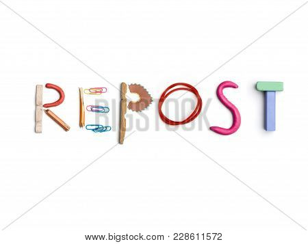 Concept Of Idea With Colorful Crumpled Paper. The Word Repost Created From Office Stationery. The Ar