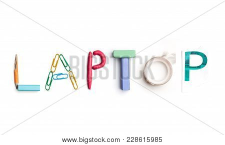 Concept Of Idea With Colorful Crumpled Paper. The Word Laptop Created From Office Stationery. The Ar