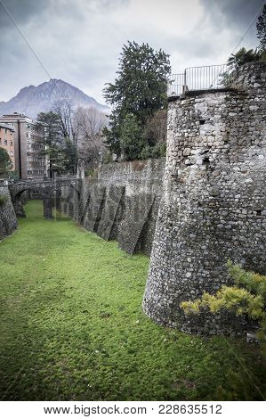 Lecco, Italy- January 10,2018: Historic Center City View, Ancient Medieval Walls In  Lecco, Italy.