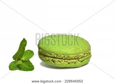 Colorful Macaroon Cookies Green With Mint Leaf On White Background